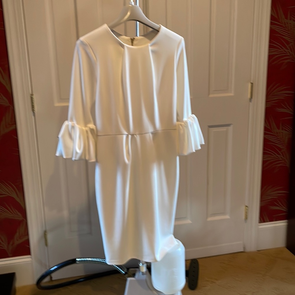 Betsy Adam cream dress with gold zipper detail at kick pleat